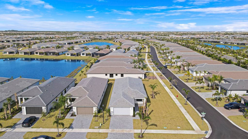 Photo of 11567 SW Oceanfront Ct, Port Saint Lucie, FL 34987 (MLS # B26000397)
