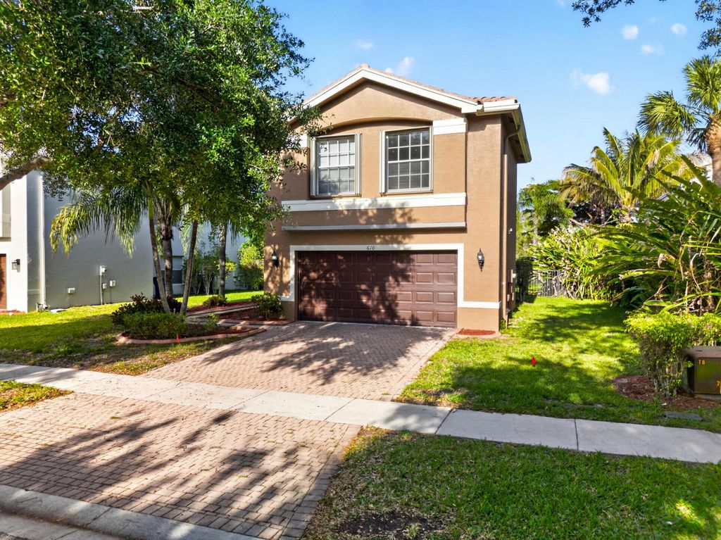 Photo of 610 Peppergrass Run, Royal Palm Beach, FL 33411 (MLS # B26022112)