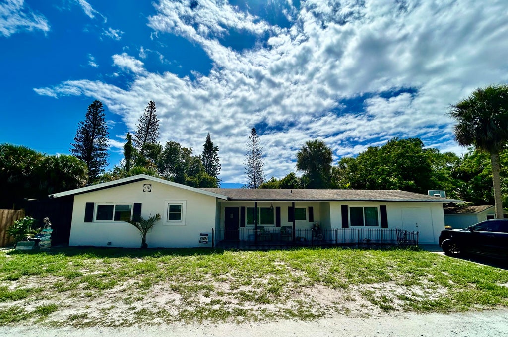 Photo of 1065 NE Banyan Tree Drive, Jensen Beach, FL 34957 (MLS # R10990524)