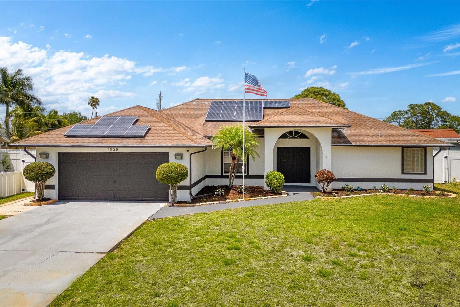 Stunning Fully Renovated 4-Bedroom, 2-Bathroom Home with Pool & 1-Car Garage in Port St. Lucie!
This beautifully updated home offers 2,000 sq. ft. of living space with an additional garage and pool area, situated on a spacious 10,000 sq. ft. lot. The home has been completely renovated, featuring brand-new flooring, modernized bathrooms, and state-of-the-art appliances throughout. Both the interior and exterior have been freshly painted, giving this home a bright, modern look. solar panels
The open-concept layout is perfect for both relaxing and entertaining, with plenty of natural light flowing throughout. Enjoy the Florida lifestyle with a private pool and a large backyard, perfect for outdoor activities and gatherings.