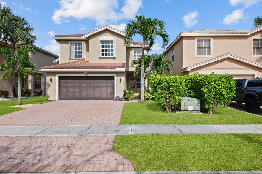 Great school district. Stunning 4-bedroom, 2 1/2-bathroom lakefront pool and spa home with  in the coveted Greystone community. The first floor boasts luxurious marble floors, while the modern kitchen features 42' custom cabinets, granite counters, and stainless steel appliances. A convenient under-stairs play/homework area for kids adds to the practicality of the space. Upstairs, all bedrooms and the laundry room feature beautiful wood-like laminate flooring. Step into the backyard oasis, complete with a serene pool area secured with a baby gate, and a luxurious hot tub. Greystone offers world-class amenities, including a fitness center, community room, resort-style pool, tot water play area, and sports facilities such as basketball, tennis, and volleyball courts Conveniently located near shopping, restaurants, and highways.