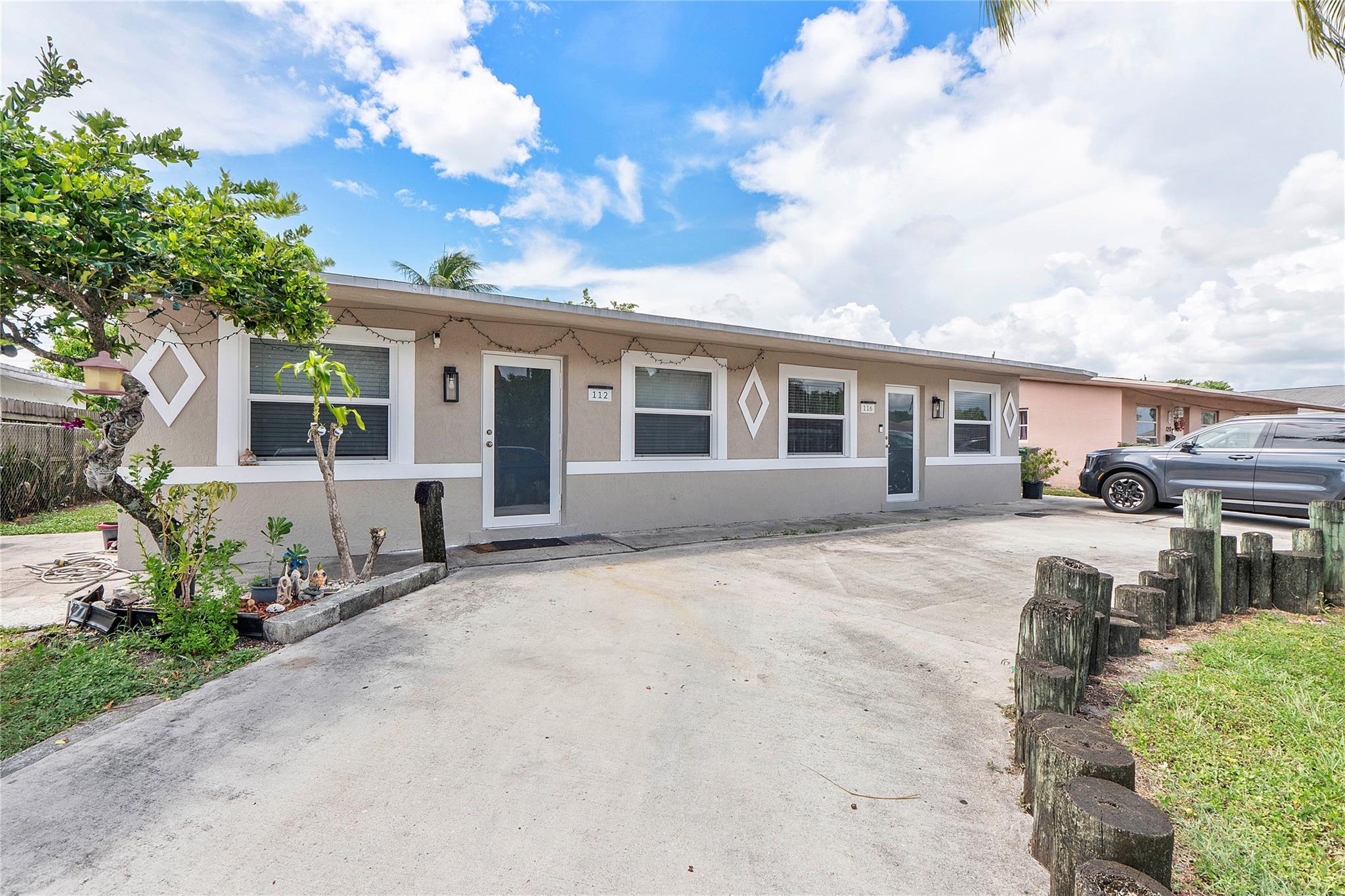 112-116 NW 57TH ST