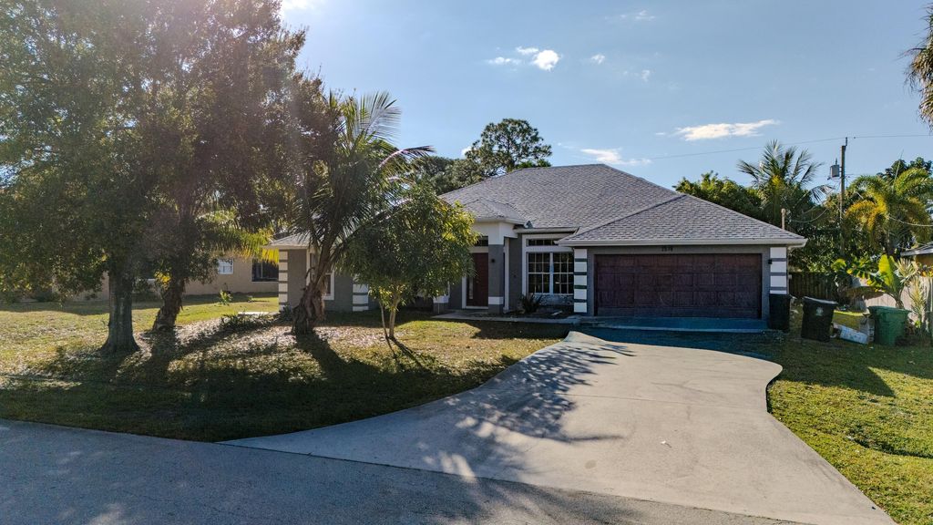 Photo of 1218 SW Melrose Avenue, Port Saint Lucie, FL 34953 (MLS # R11153377)