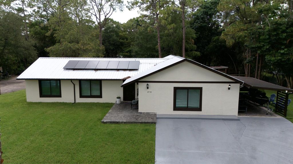 Photo of 4721 Coconut Boulevard, The Acreage, FL 33411 (MLS # R11107066)