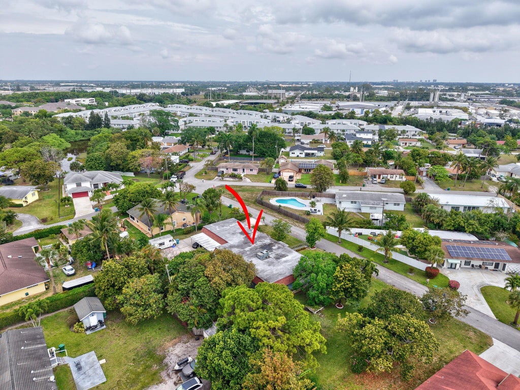 Photo of 1616 Crandon Avenue, Mangonia Park, FL 33407 (MLS # R11072784)
