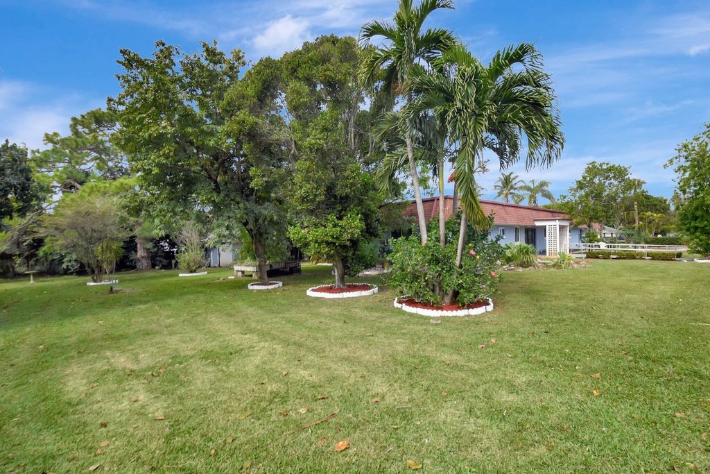 Photo of 1616 Crandon Avenue, Mangonia Park, FL 33407 (MLS # R11072784)