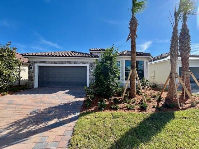 NEW CONSTRUCTION: Immediate Move in = Immediate Savings! This 2 bedroom plus Den Palmary plan is an absolute jewel due to it's impressive gathering area and built in kitchen. Enjoy the premier Southern exposure in your private backyard from the screened in lanai. On-trend designer finishes can be found at every turn. Price includes Builder's entire Flex Cash savings OR you can choose to use a part of the incentive towards a special Interest Rate Buydown Program Available to help you save BIG and make your homebuying dollars go further.