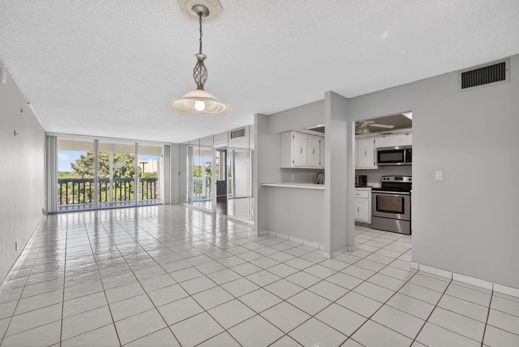 Photo of 7011 Environ Boulevard #412, Lauderhill, FL 33319 (MLS # B26016884)