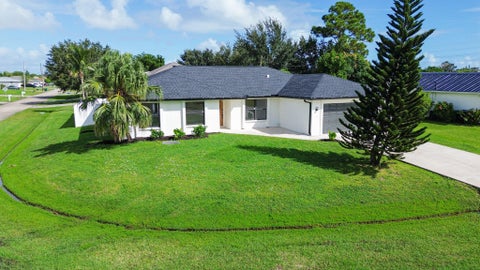 Photo of 2291 SW Jay Avenue, Port Saint Lucie, FL 34953 (MLS # B26090857)
