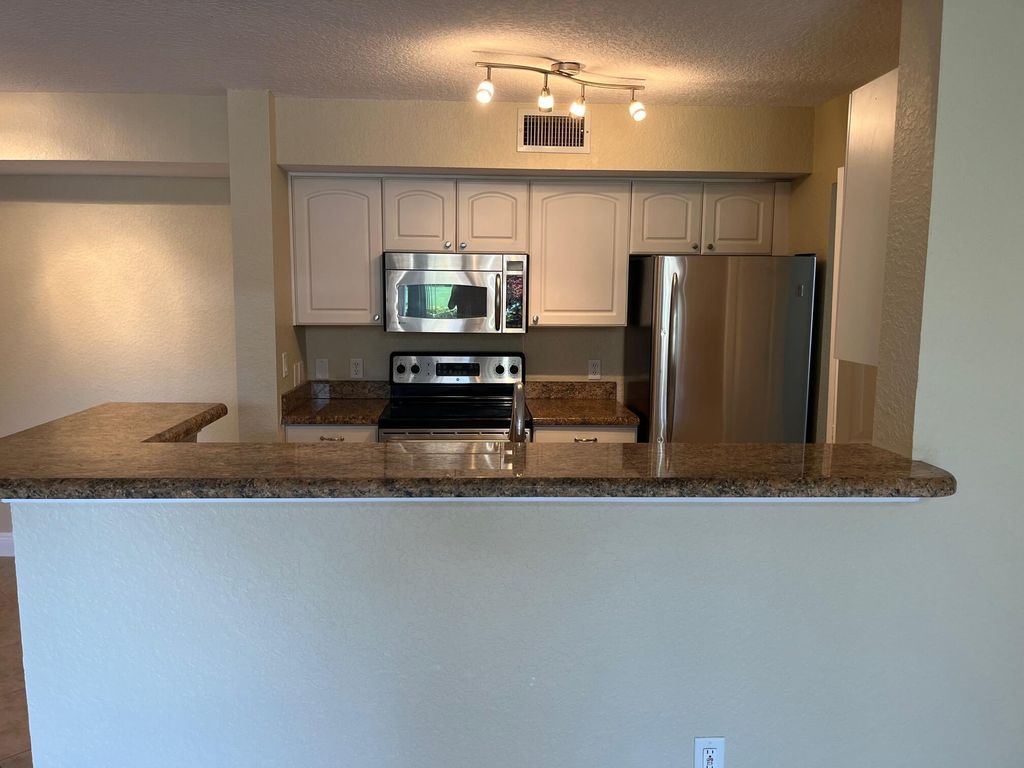 Photo of 110 Yacht Club Way #102, Hypoluxo, FL 33462 (MLS # R11074797)