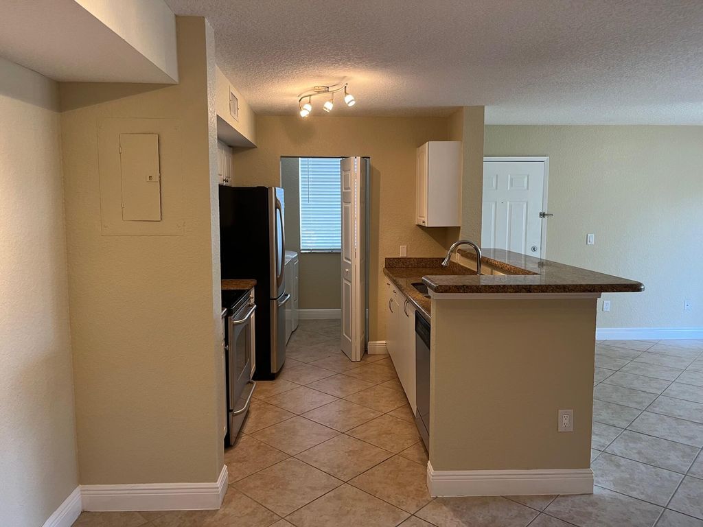 Photo of 110 Yacht Club Way #102, Hypoluxo, FL 33462 (MLS # R11074797)