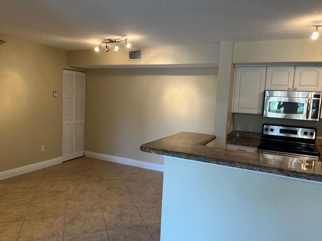 Photo of 110 Yacht Club Way #102, Hypoluxo, FL 33462 (MLS # R11074797)