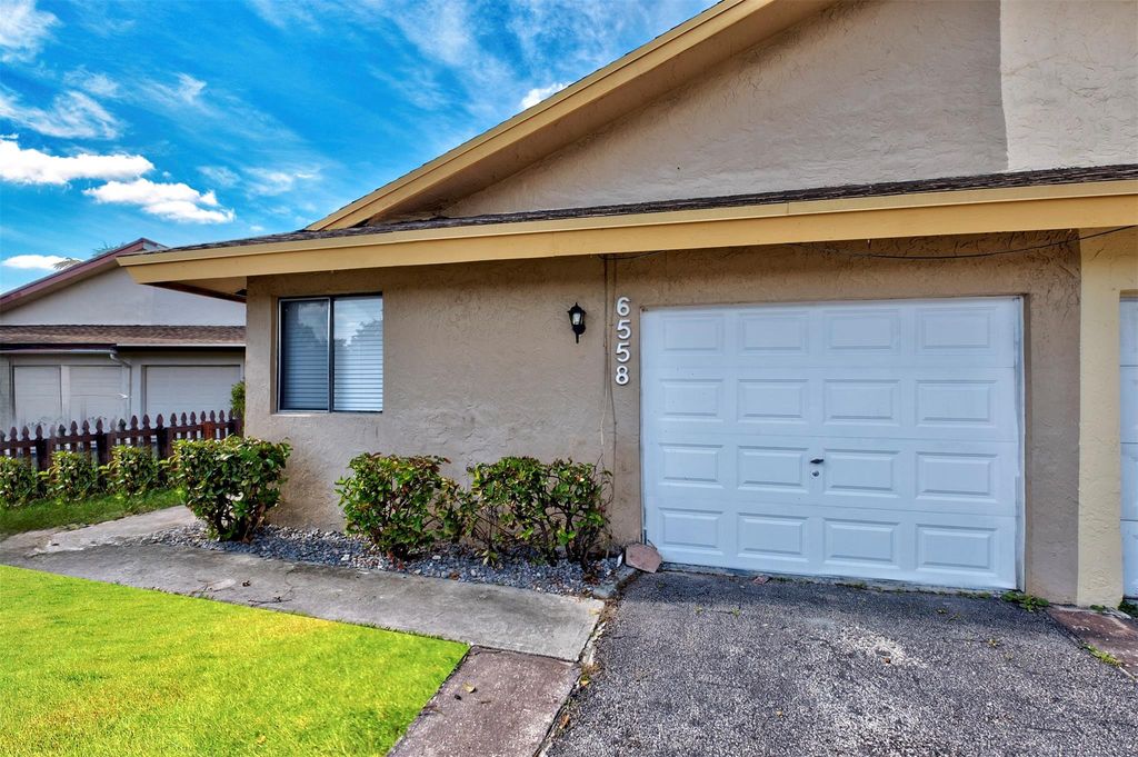 Photo of 6558 Harbour Rd, North Lauderdale, FL 33068 (MLS # F10540931)