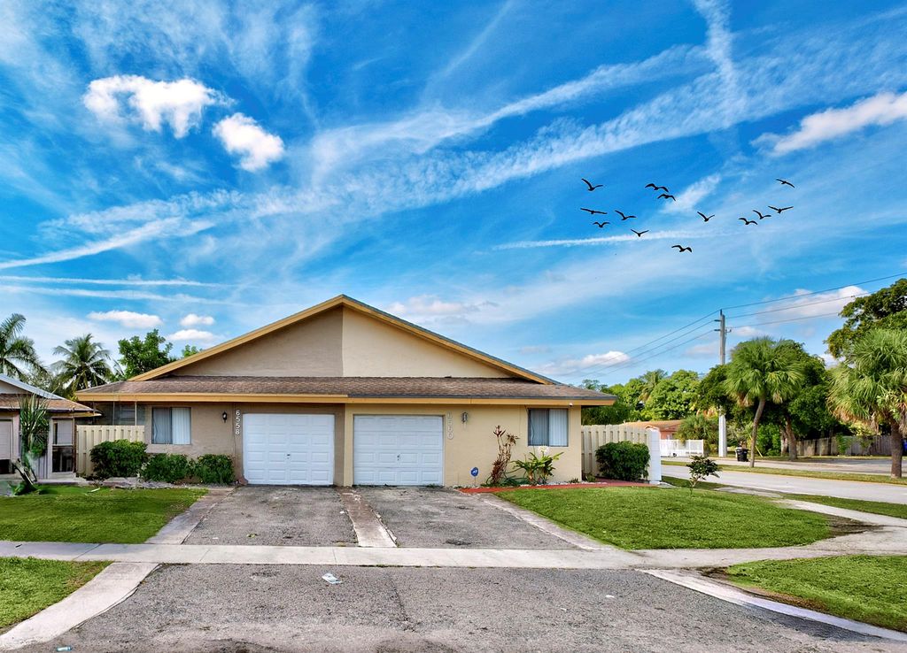 Photo of 6558 Harbour Rd, North Lauderdale, FL 33068 (MLS # F10540931)