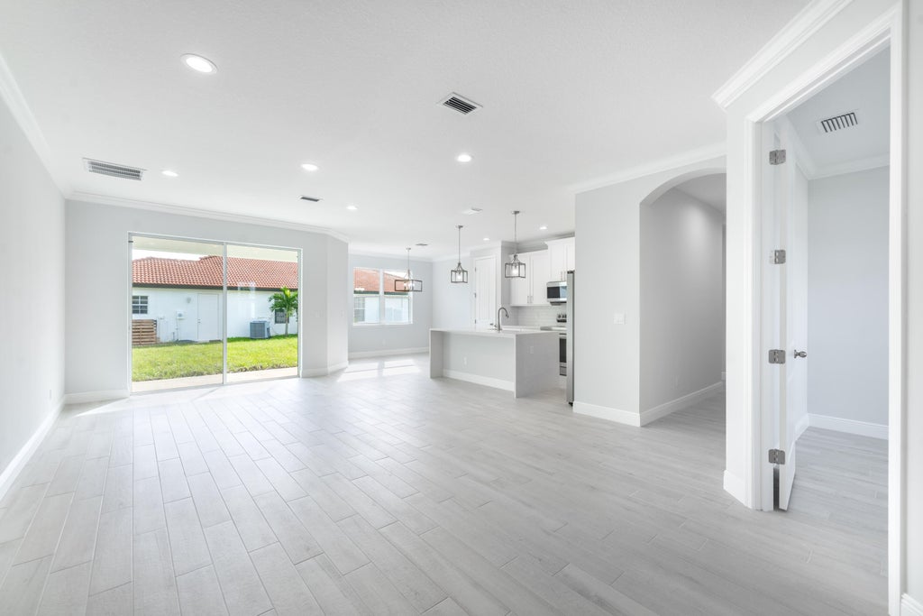 Photo of 4022 SW Carlile Street, Port Saint Lucie, FL 34953 (MLS # R11056126)