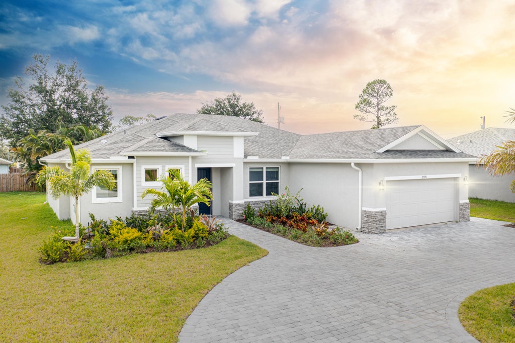 Photo of 4022 SW Carlile Street, Port Saint Lucie, FL 34953 (MLS # R11056126)