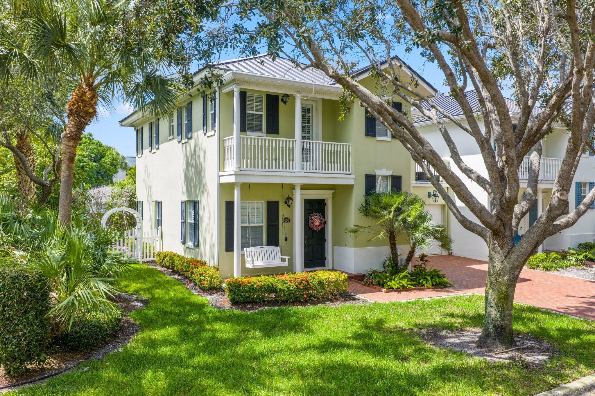 Welcome to this rarely available, 2-story, corner residence in the desirable and picturesque, Heritage Club neighborhood of east Delray. Offering ample outdoor living space to enjoy the year-round sunshine with a charming front porch, private fenced in yard & back patio, rooftop terrace and green space to the south. With updated kitchen countertops & backsplash, newer appliances, light fixtures, plantation shutters on the main level, refinished hardwood floors on the first floor, updated bathrooms and a large, paved driveway to accommodate 3 vehicles in addition to a spacious 2 car garage, this is what you've been waiting for. With an abundance of natural light, this bright and spacious, move in ready, 3-bedroom, 2.5-bathroom townhome with a den is ready to call home.