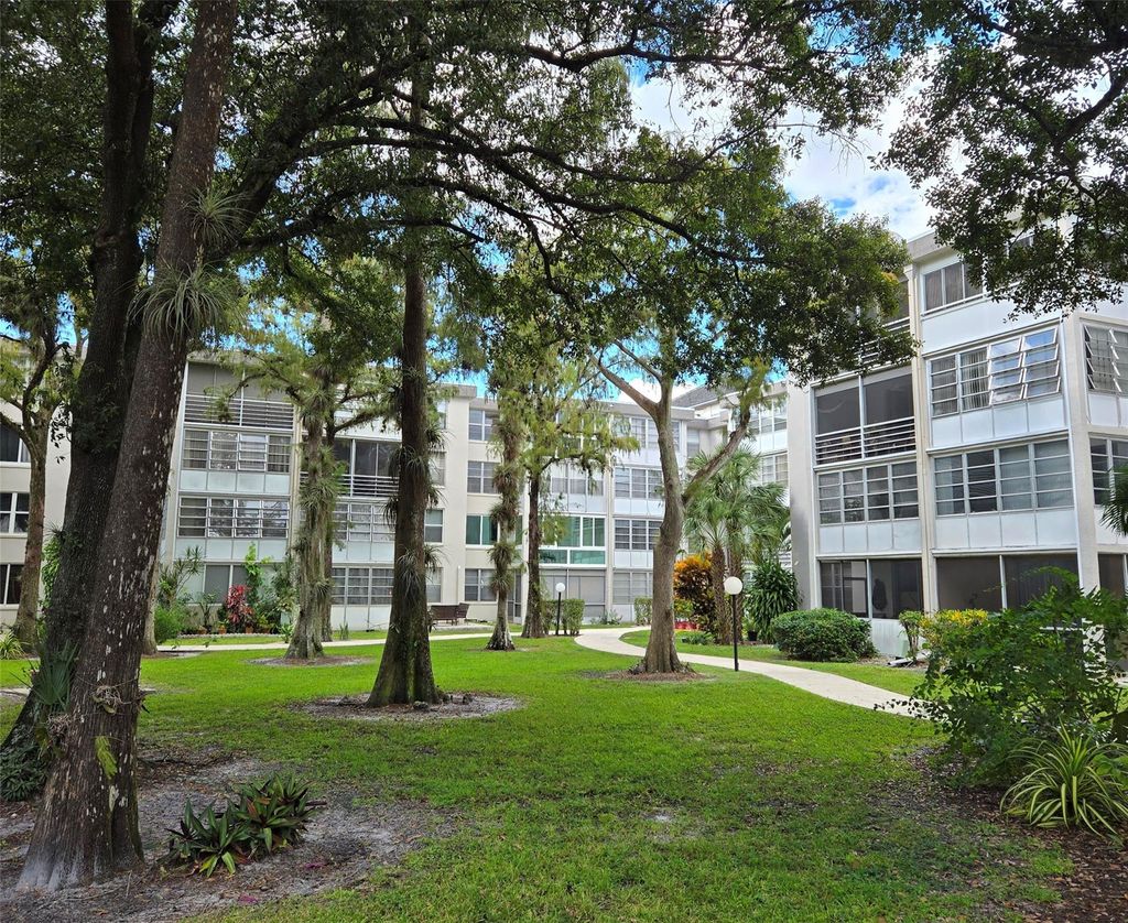 Photo of 4898 NW 29th Ct #412, Lauderdale Lakes, FL 33313 (MLS # F10537048)