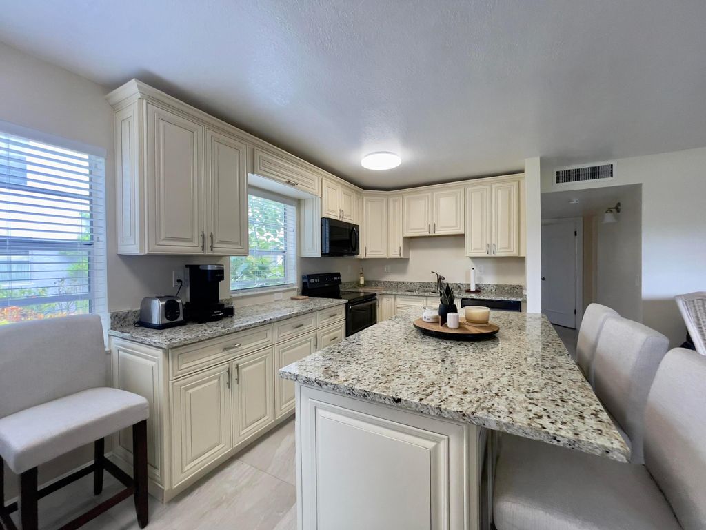 Photo of 117 Flanders C, Delray Beach, FL 33484 (MLS # R11108939)