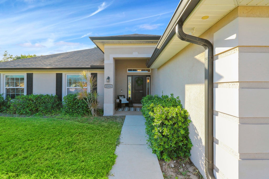 Photo of 2314 SW Dodge Terrace, Port Saint Lucie, FL 34953 (MLS # R10963888)