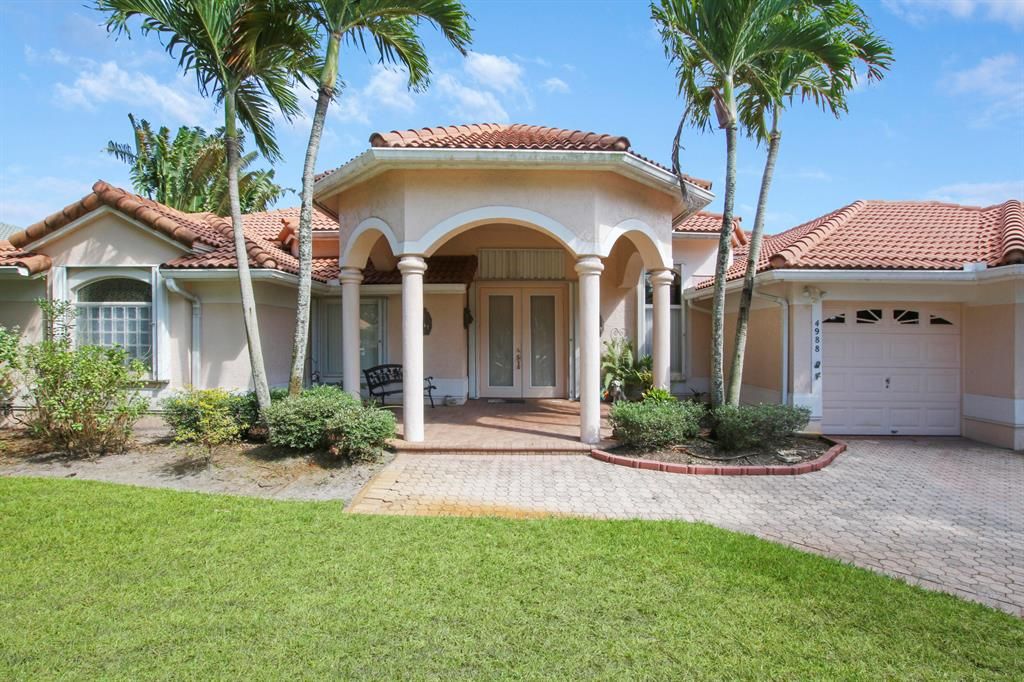 Photo of 4988 SW Hammock Creek Drive, Palm City, FL 34990 (MLS # R10718593)