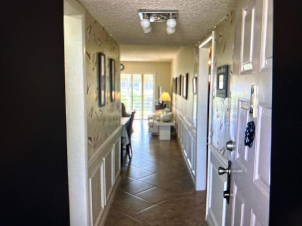 Photo of 3212 Strawflower Way #206, Greenacres, FL 33467 (MLS # R11147011)