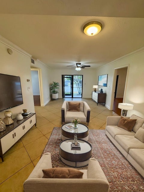 Photo of 10022 Winding Lake Road #102, Sunrise, FL 33351 (MLS # B26063069)
