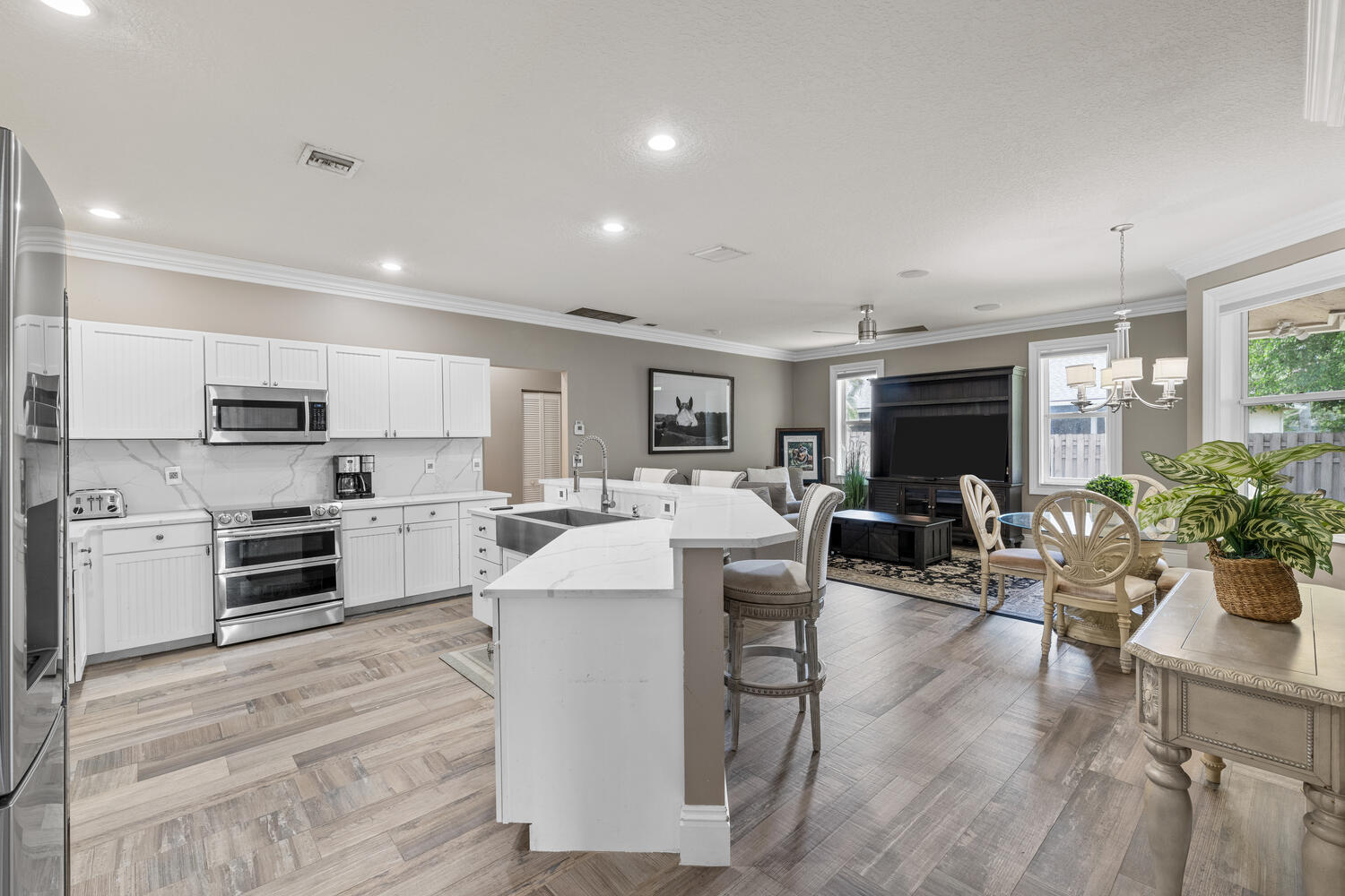 Location!!! Experience the ultimate Wellington lifestyle at this beautiful 5/3 home directly across from wellington International Equestrian Center! Walk , bike or golf cart the horse show. No HOA & pets allowed!