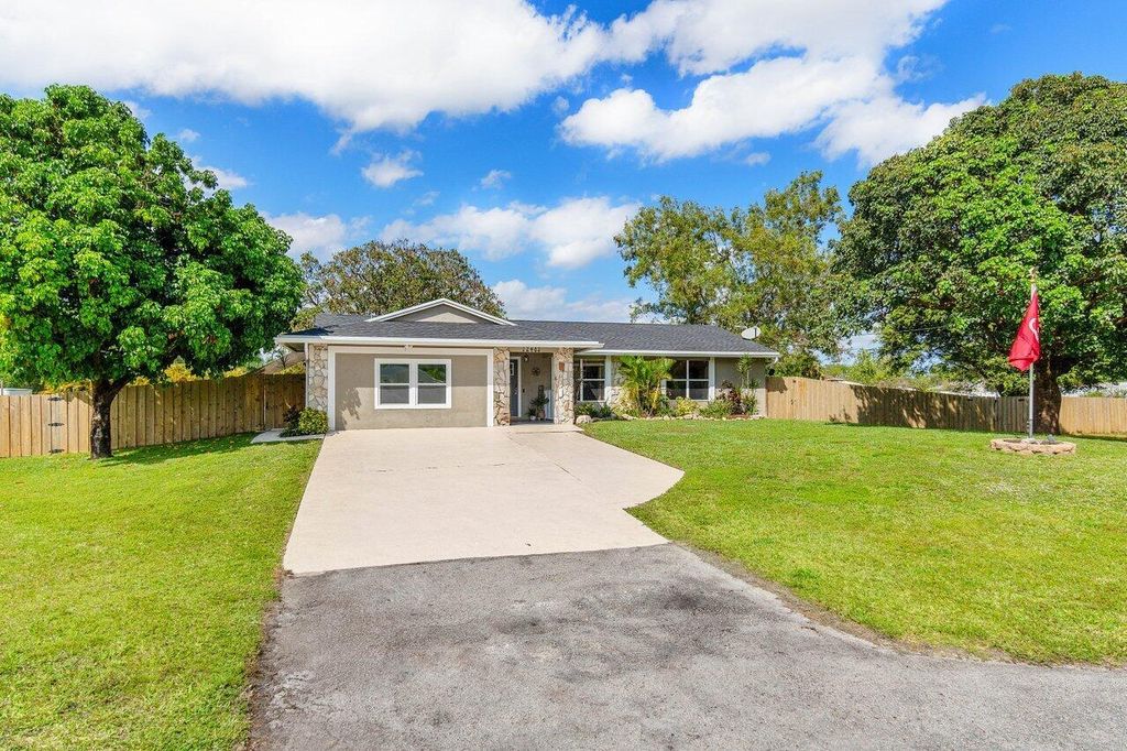 Photo of 12483 67th Street N, The Acreage, FL 33412 (MLS # R10967467)