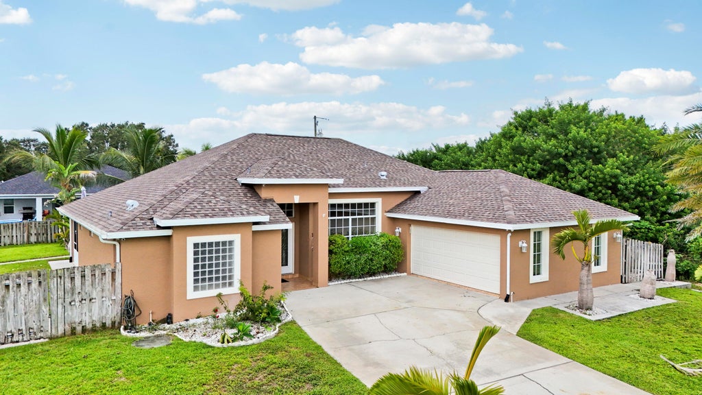 Photo of 1114 SW Kalevala Drive, Port Saint Lucie, FL 34953 (MLS # B26012593)
