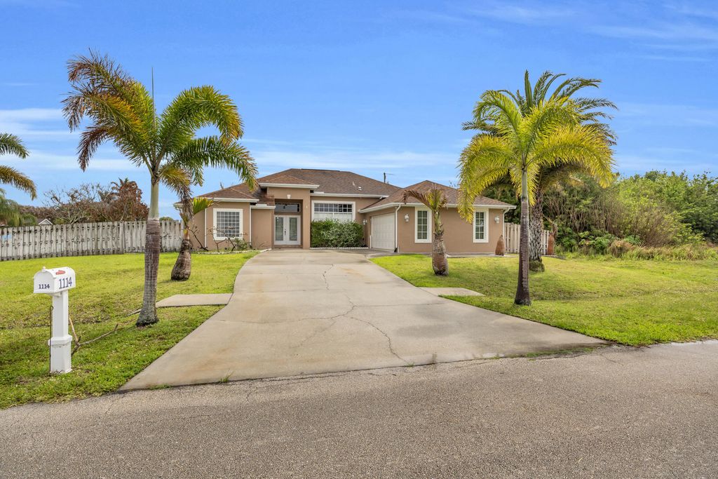 Photo of 1114 SW Kalevala Drive, Port Saint Lucie, FL 34953 (MLS # B26012593)