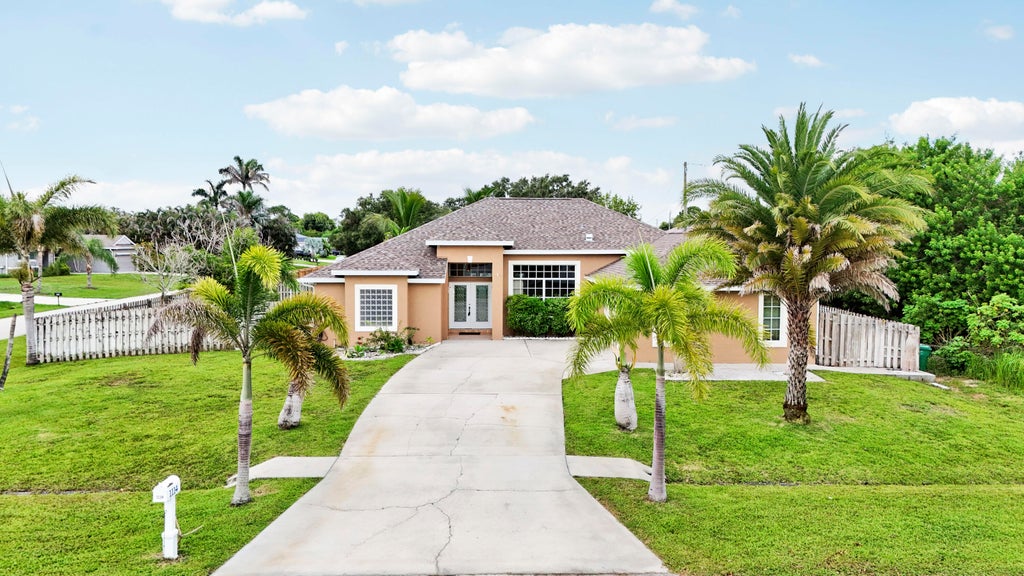 Photo of 1114 SW Kalevala Drive, Port Saint Lucie, FL 34953 (MLS # B26012593)