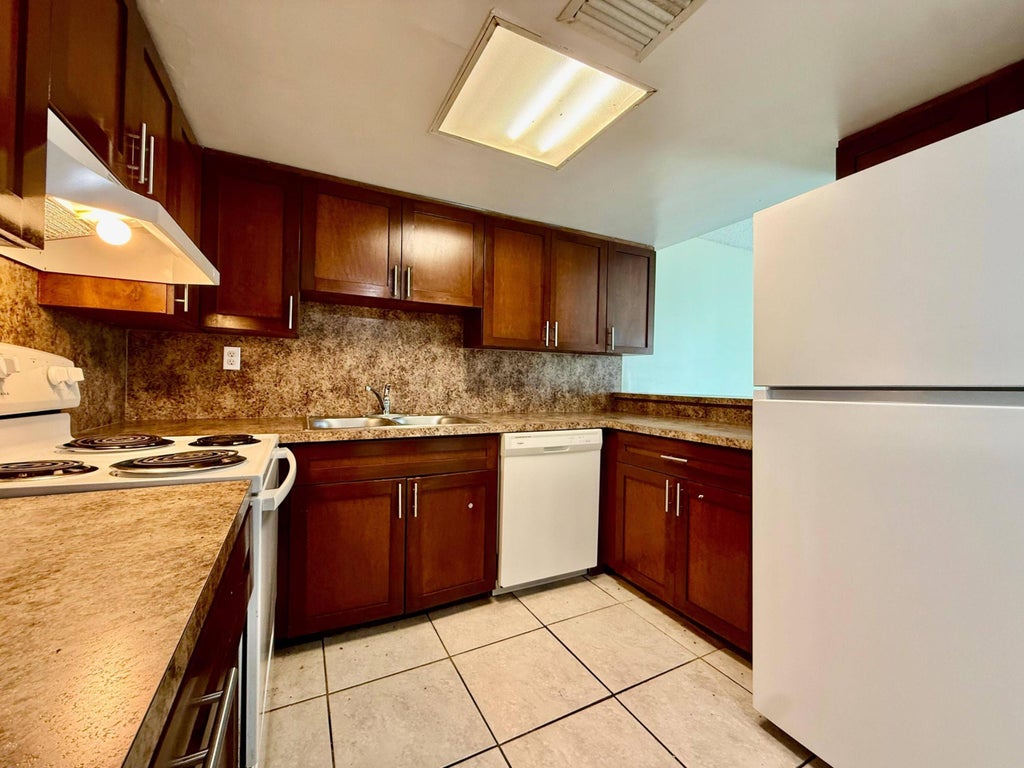 Photo of 343 Gulfstream Road, Dania Beach, FL 33004 (MLS # B26069364)