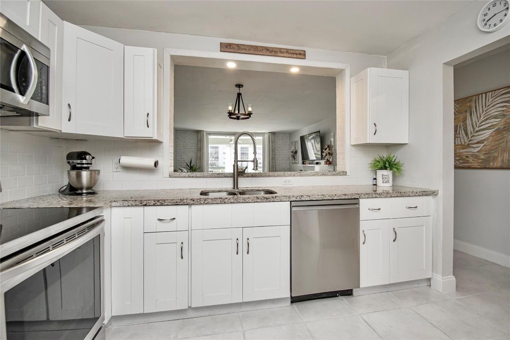 Photo of 1024 SE 4th Avenue #102, Dania Beach, FL 33004 (MLS # F10535082)