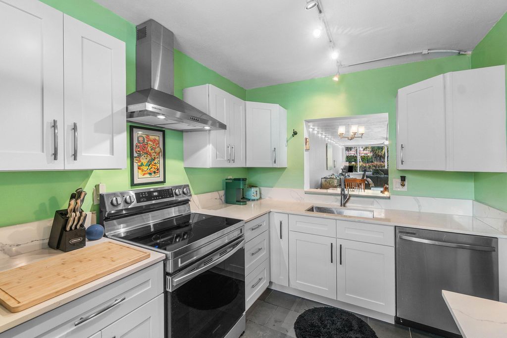 Photo of 2825 SW 22nd Avenue #104, Delray Beach, FL 33445 (MLS # B26011001)