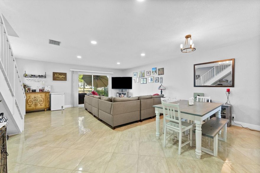 Beautifully updated 3 bedroom townhome with 2 and a half bathrooms in highly sought-after Pine Island Villas! Centrally located just minutes to Plantation Walk, Central Park, and major highways (I-595, I-95 & Turnpike). This bright and open home features a remodeled kitchen that’s been opened up—unlike most units in the community—creating a spacious, airy feel downstairs. Enjoy lake views from the main living area, 2024 roof and water heater, impact windows for peace of mind and a private patio perfect for relaxing or entertaining. Low-maintenance living in one of Plantation’s most convenient locations!