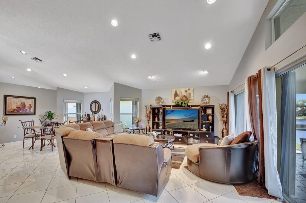 Photo of 115 Harbor Lake Circle, Greenacres, FL 33413 (MLS # R10988017)