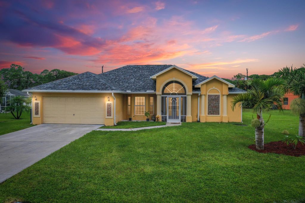 Photo of 2771 SW Pierson Road, Port St Lucie, FL 34953 (MLS # R10919156)