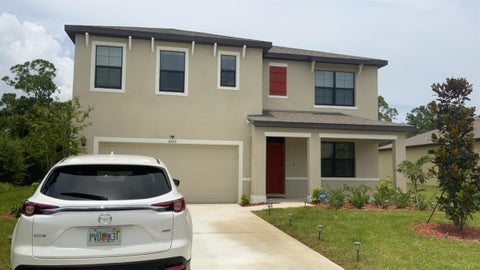 Photo of 6043 NW REGENT Street, Port Saint Lucie, FL 34983 (MLS # B26071757)