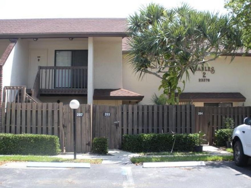 Great location for this 1/1 condo-ready to move right in with new carpeting and paint. OK to rent out right away! Courtyard entrance, downstairs area for table and chairs, upstairs balcony at front door.  Open living, dining room, kitchen with snack bar,large private bedroom with peaceful view of garden with canal beyond.  Combo washer and dryer in unit.  Community pool and handball court. Near shopping, bus routes, all major commutes.  COME HOME TO THE GABLES OF BOCA BARWOOD!