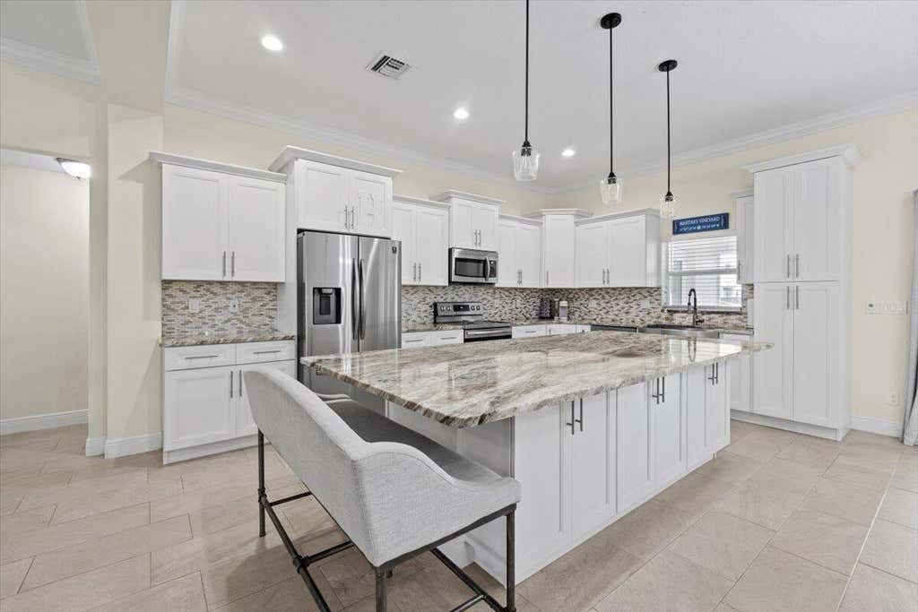 Photo of 1602 SW Glacador Avenue, Port Saint Lucie, FL 34953 (MLS # R11033480)