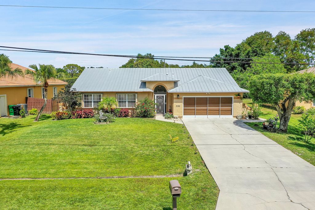 Photo of 6754 NW Argus Street, Port Saint Lucie, FL 34983 (MLS # R10984425)