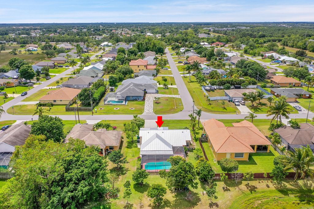 Photo of 6754 NW Argus Street, Port Saint Lucie, FL 34983 (MLS # R10984425)