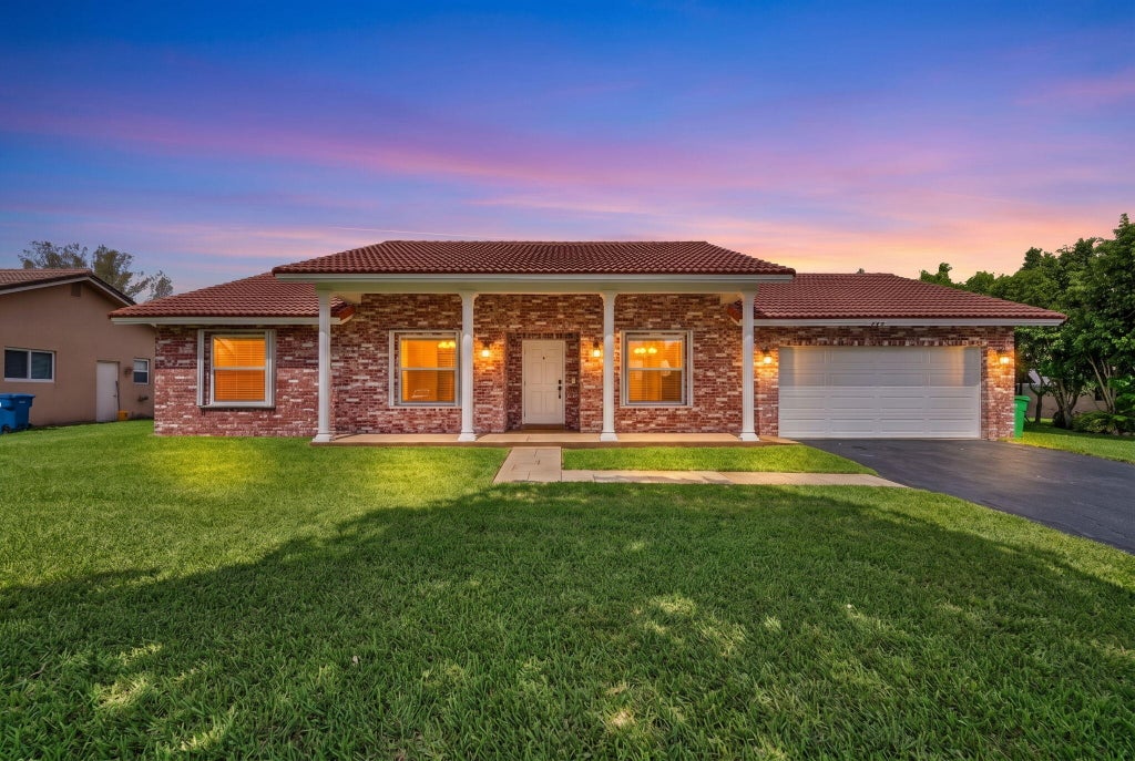 Photo of 905 NW 133RD Avenue, Sunrise, FL 33325 (MLS # B26058641)