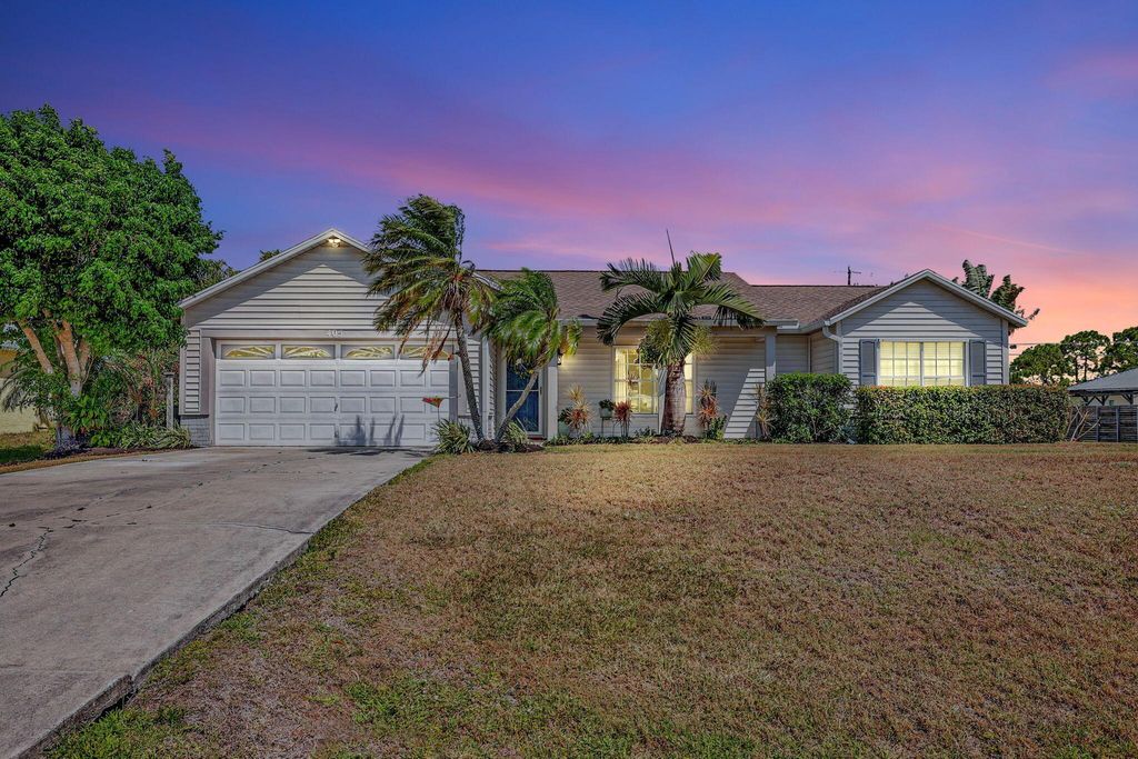 Photo of 405 SW Saginaw Avenue, Port Saint Lucie, FL 34953 (MLS # R10979944)
