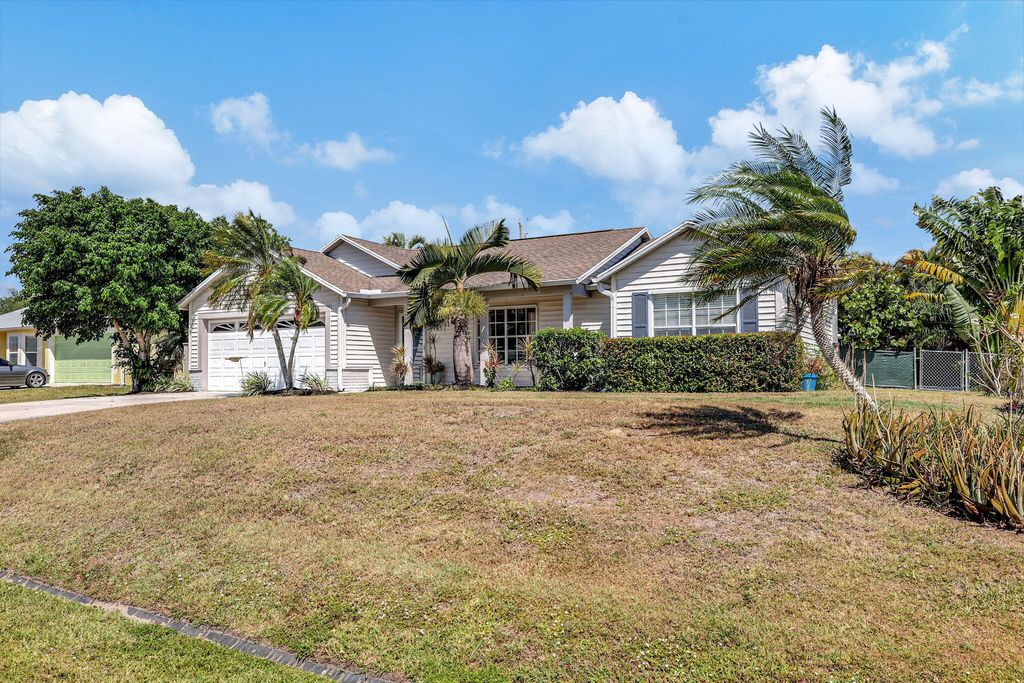 Photo of 405 SW Saginaw Avenue, Port Saint Lucie, FL 34953 (MLS # R10979944)