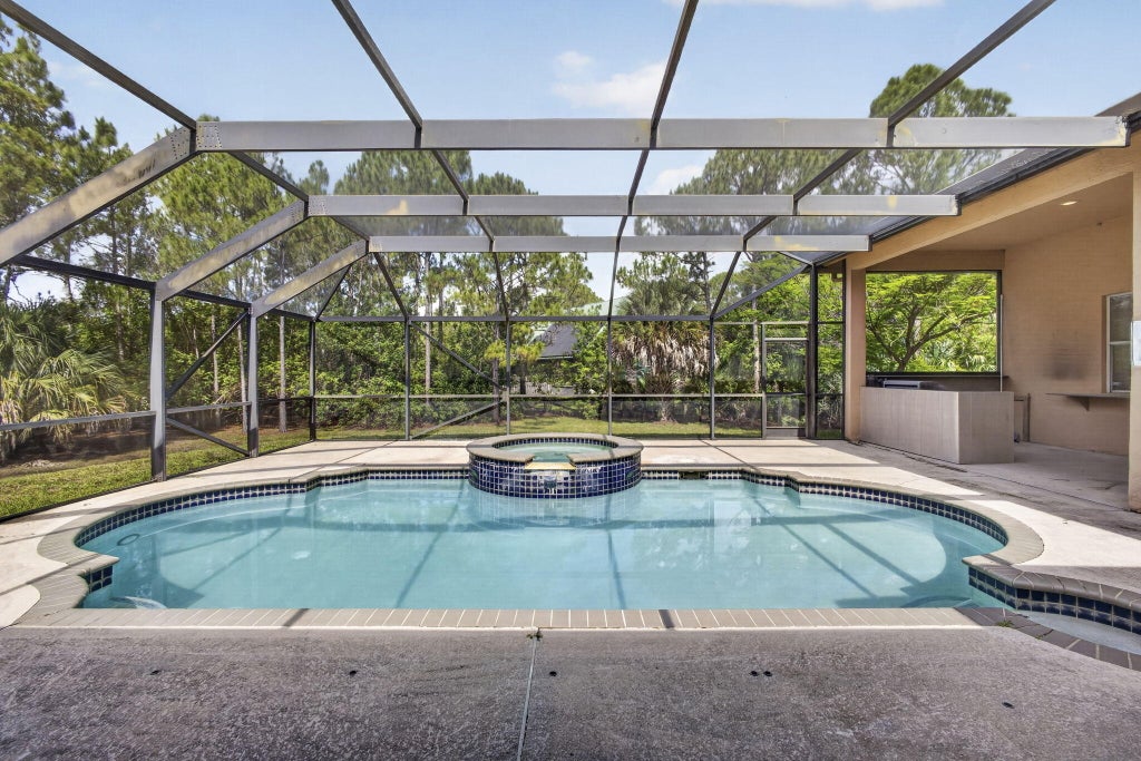 Photo of 16300 92nd Lane N, Loxahatchee, FL 33470 (MLS # B26042198)