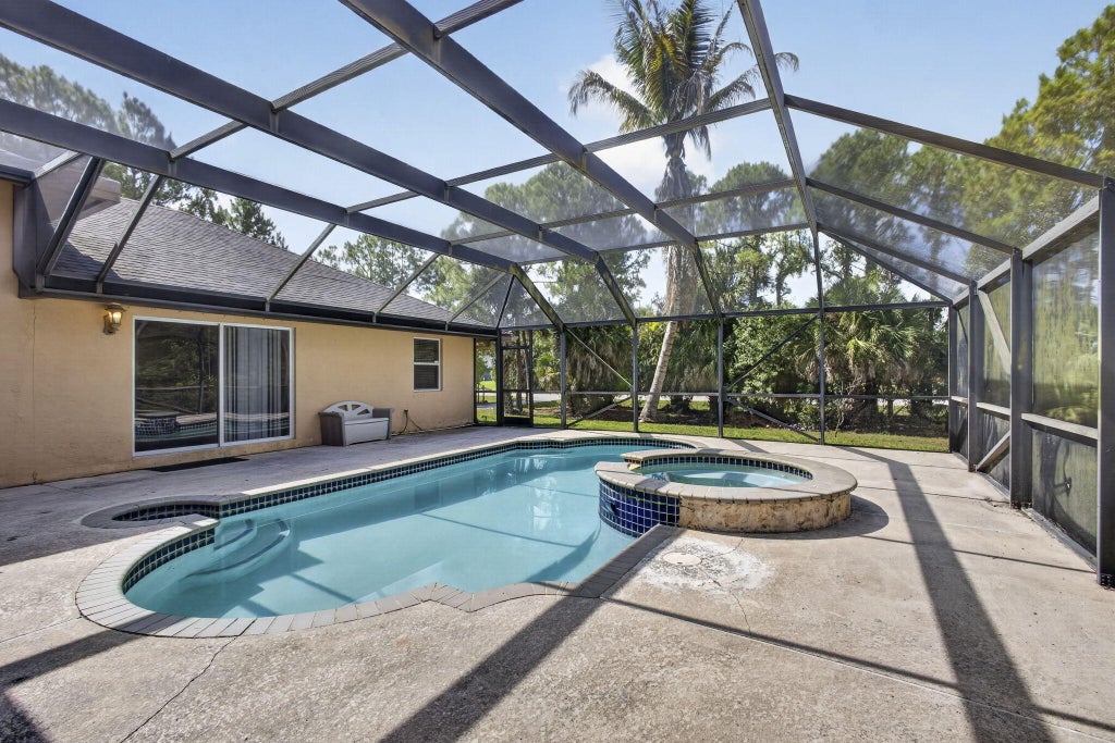Photo of 16300 92nd Lane N, Loxahatchee, FL 33470 (MLS # B26042198)