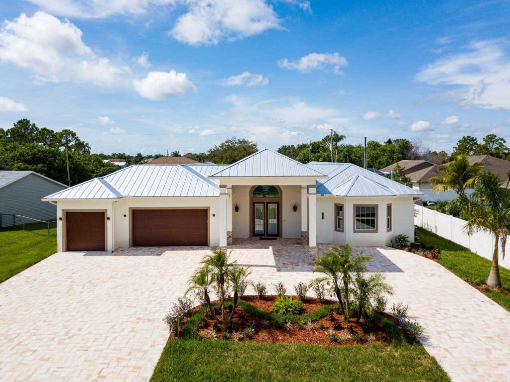 Photo of 2682 SW IMPORT Drive, Port Saint Lucie, FL 34987 (MLS # B26064146)