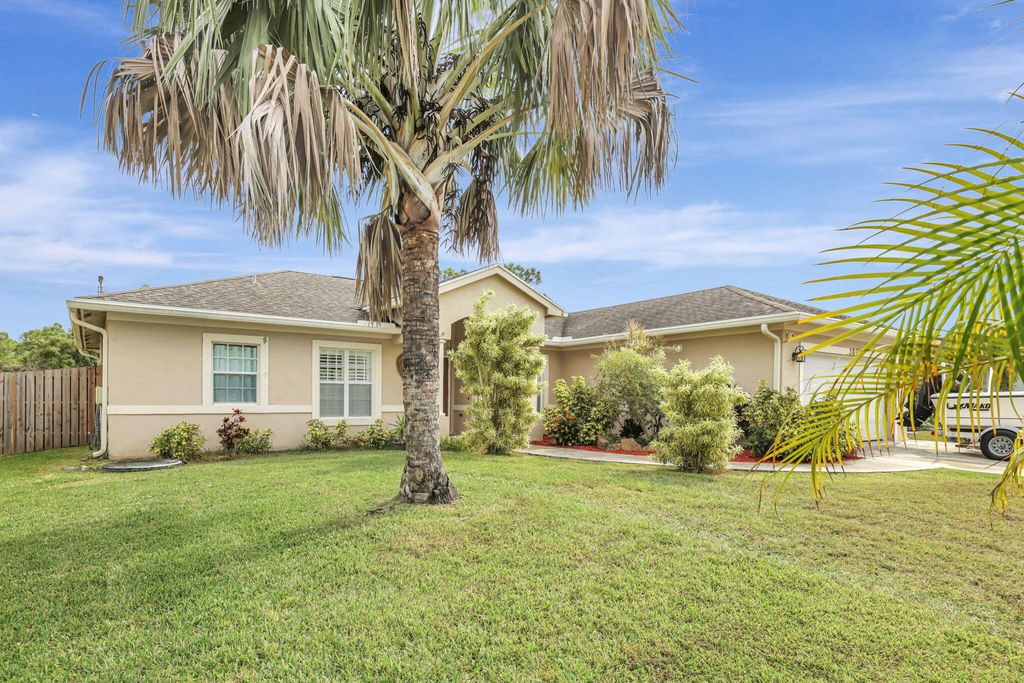 Photo of 3837 SW Daisy Street, Port Saint Lucie, FL 34953 (MLS # R11144039)